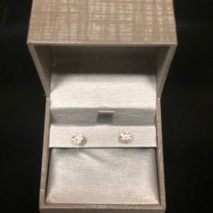 1 ct 14k white gold round cut solitaire earrings.